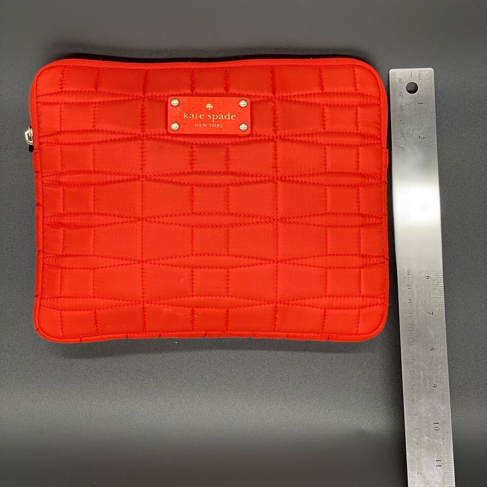 Red Kate Spade bag.  Great condition inside and out.